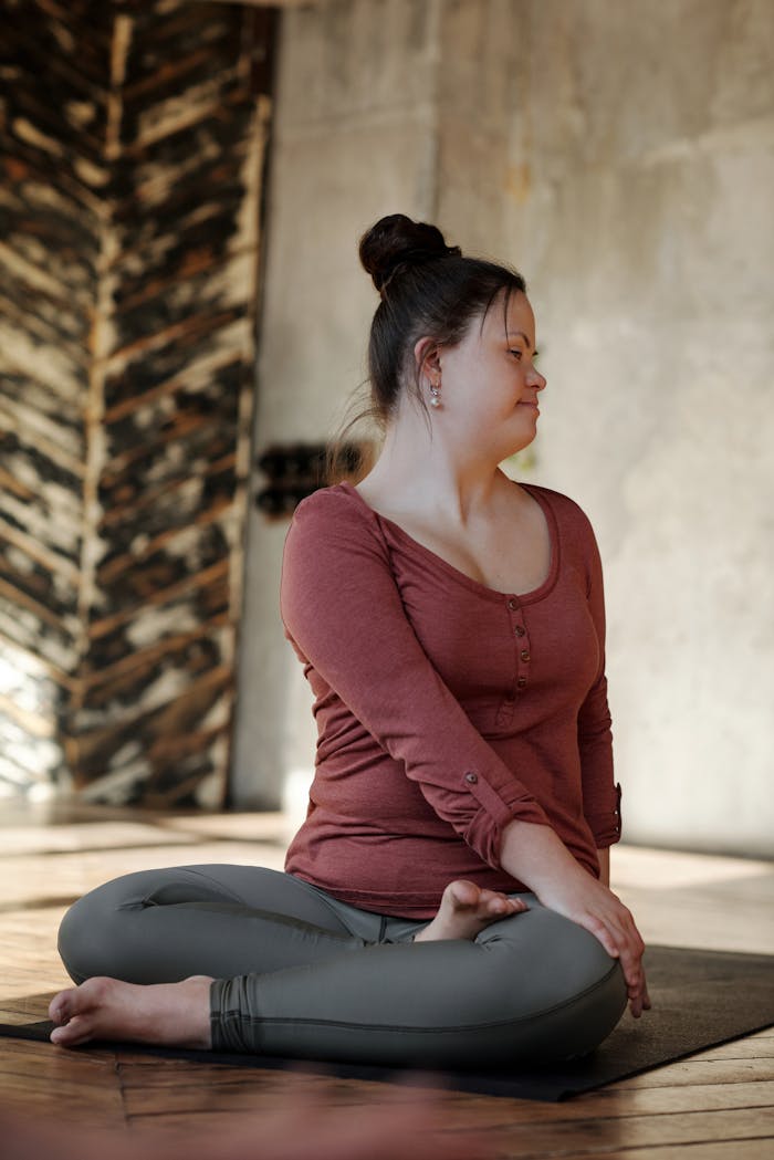 Photo Of Young Woman In A Yoga Position